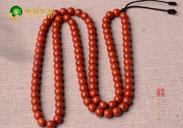 柿子红南红挂件珠串选购可从颜色透明度产地方面入手